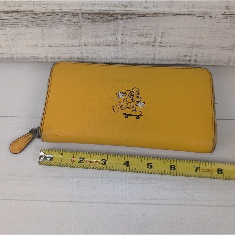 Coach + Disney Mickey Mouse Skateboard Yellow Leather Accordion Zip Wallet